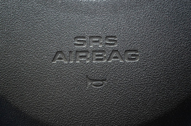 Inscripción AIRBAG en superficie texturizada