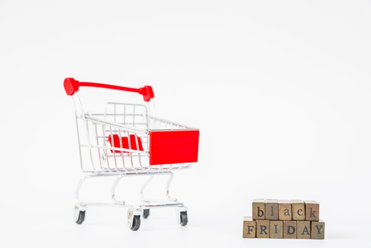 Foto inscripción de viernes negro cerca de carrito de compras