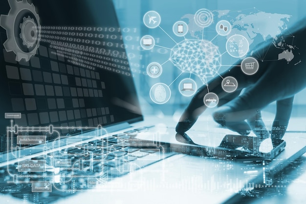 Inteligencia artificial (IA) Internet de las cosas (IoT) concepto hombre de negocios que utiliza un teléfono inteligente computadora portátil en el fondo de la tecnología