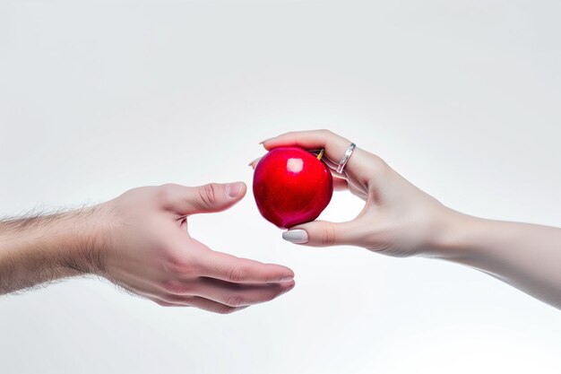Foto intercâmbio conceitual homem e mulheres mãos com maçã vermelha