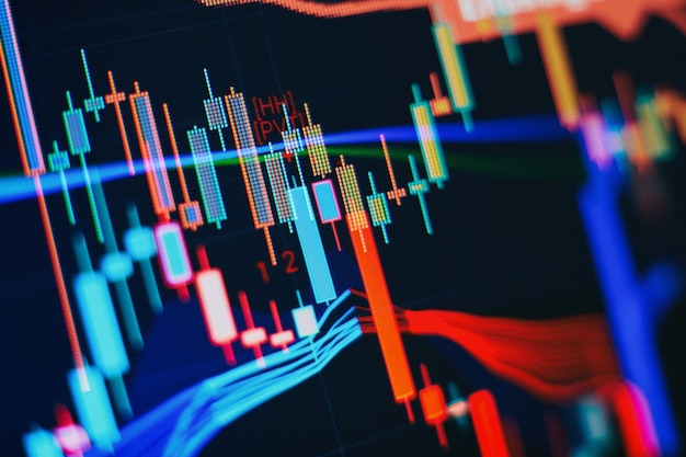 Interface de gráfico digital sobre fundo azul escuro conceito de mercado de ações e sucesso financeiro