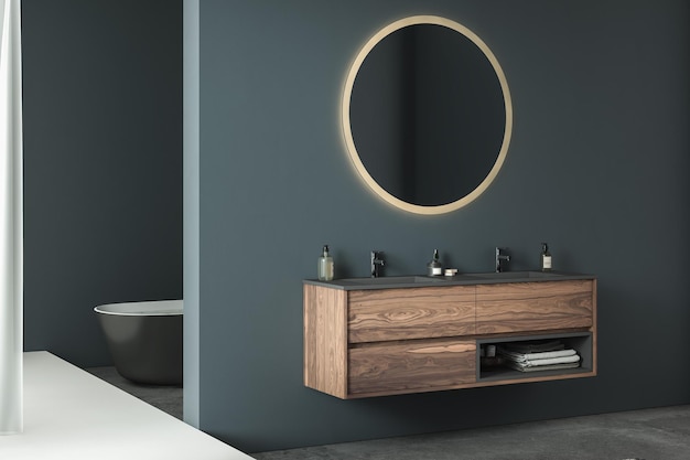 Interior de baño minimalista moderno, mueble de baño moderno, lavabo doble, espejo ovalado, hormigón.