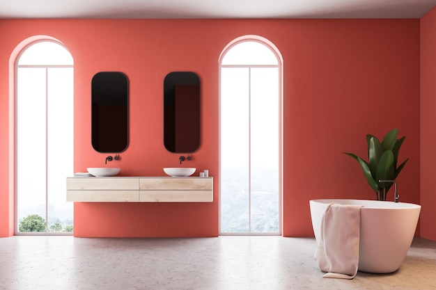 Interior de baño rojo minimalista con una bañera blanca, una toalla colgada, un lavabo doble, un árbol en maceta y una lámpara en la esquina. Una vista lateral. maqueta de renderizado 3d