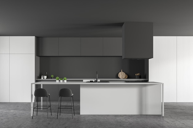 Interior de cocina moderna con paredes grises, suelo de piedra, encimeras gris oscuro, armarios blancos y barra blanca con taburetes. representación 3d