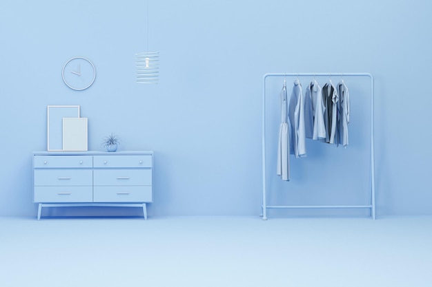 Interior da sala em cor azul monocromática com roupas em um cabide e acessórios de quarto