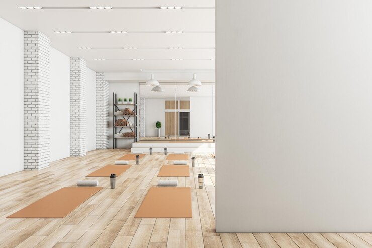 Foto interior de ginásio de ioga de concreto moderno com espaço de maquete em branco de equipamento na parede luz do dia e piso de madeira conceito de estilo de vida saudável mock up renderização em 3d