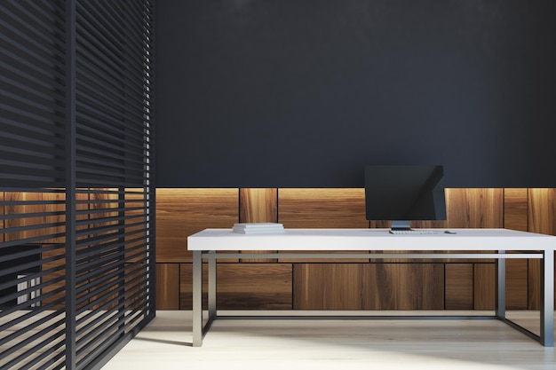 Interior do escritório do gerente com paredes pretas e de madeira, piso de madeira e uma mesa branca com um computador. Um close. simulação de renderização 3D