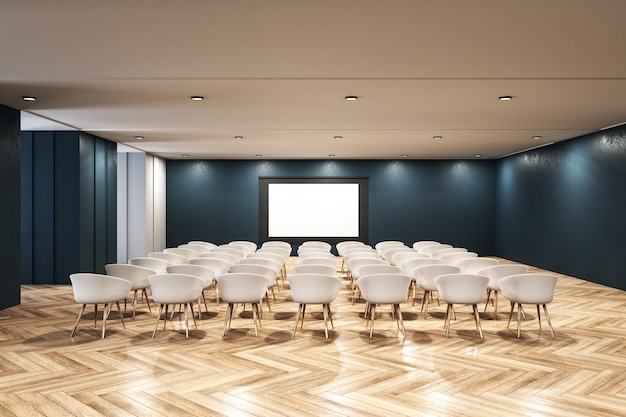 Interior minimalista de una sala de presentación con sillas blancas y pantalla en blanco