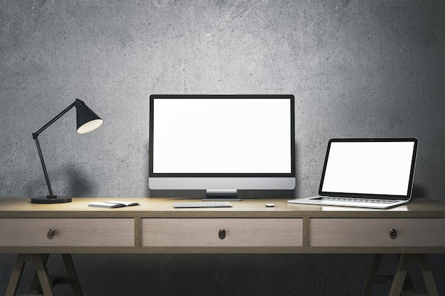 Interior de oficina de diseño minimalista moderno con monitores de computadora y portátil blancos en blanco Mock up 3D Rendering