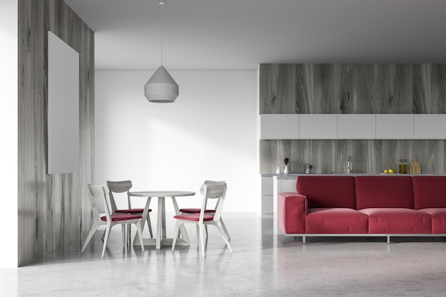 Interior de salón moderno con paredes blancas y de madera, un sofá rojo y una mesa con sillas alrededor. maqueta de renderizado 3d