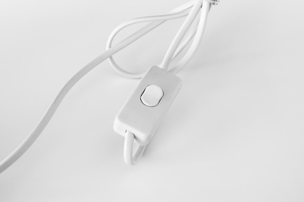 Foto interruptor de iluminação sob o foco seletivo de fundo branco