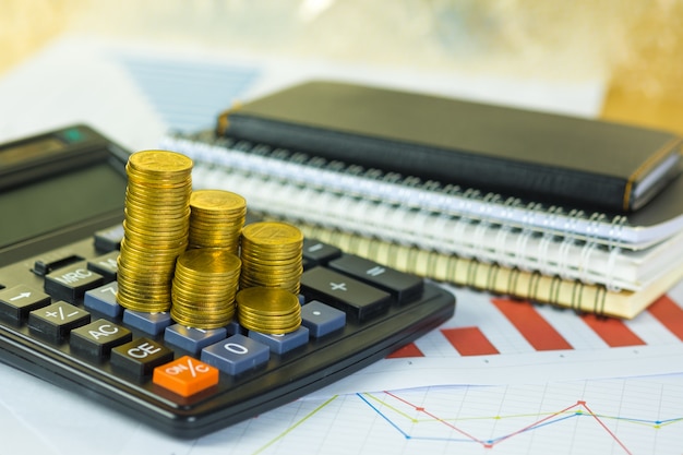 Invente a pilha e a folha financeira do papel de gráfico com a calculadora na tabela de funcionamento, na visão do planeamento empresarial e no conceito da análise da finança.