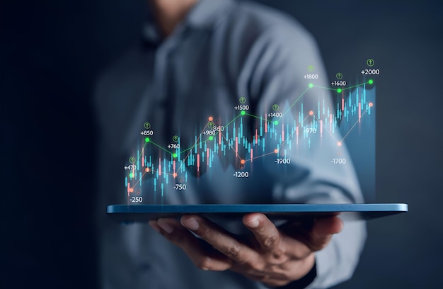 Inversores empresariales inversión en el mercado bursátil utilizando teléfonos inteligentes para analizar los datos comerciales análisis de inversores con gráfico de bolsa en la pantalla Mercado bursátil financiero