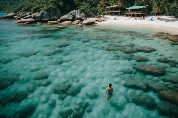 La isla de La Digue en las Seychelles Playa plateada con piedra granítica y selva Hombre disfrutando de sus vacaciones