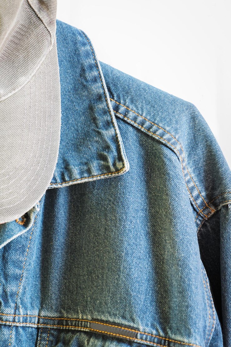 Foto jacket de denim de close-up e boné