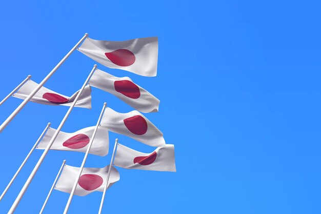 Japan-Flaggen wehen im Wind gegen einen blauen Himmel d-Rendering