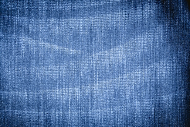 Jeans abstratos com marcas rasgadas Tom de cor retrô de textura de tecido de jeans azul para design de moda de site de fundo ou produto de pano de fundo