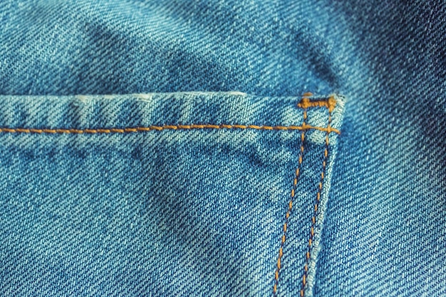 jeans casual clássico com costura de bolso em close-up textura