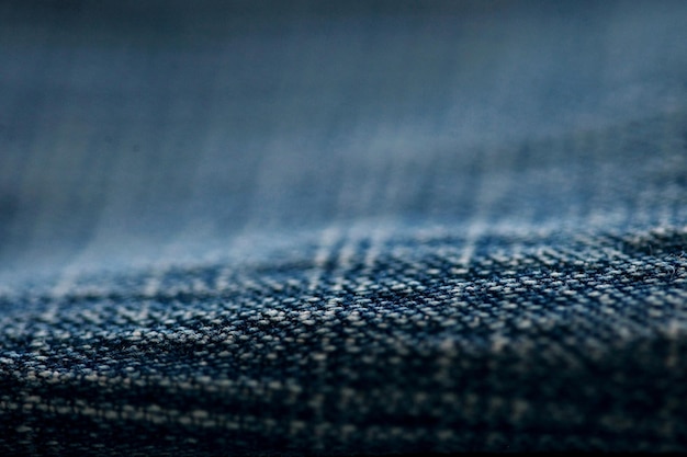 Jeans-Denim-Textur, Nahaufnahme, Fokus nur auf einen Punkt, weiche, verschwommene Hintergrundbilder