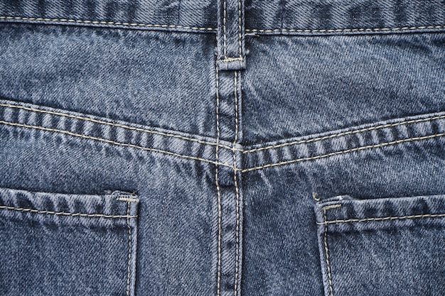 Jeans Hintergrund, Denim mit Naht des Modedesigns