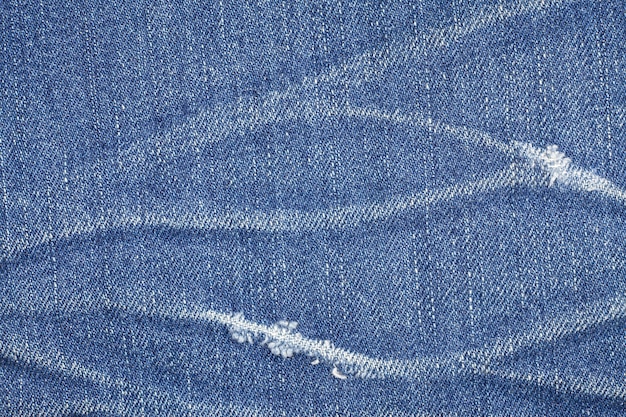 Jeans rasgados textura de mezclilla.