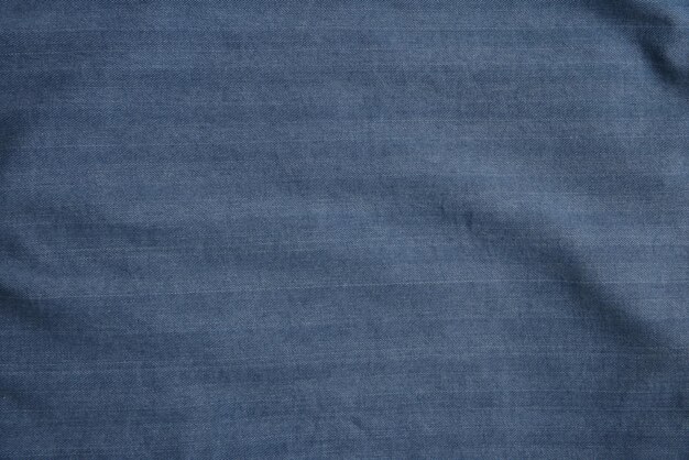 Foto jeans-textur, detaillierte nahaufnahme, vintage, alter strukturierter stoff, sackleinen, rustikaler hintergrund in schwarz-grauem leinwandmuster