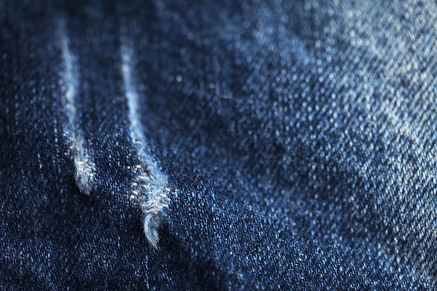 Jeans textura de mezclilla primer plano enfoque solo un punto fondo de pantalla de fondo borroso suave