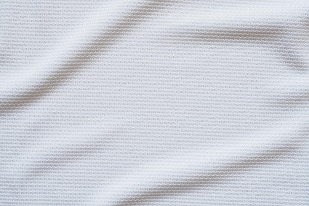 Jersey de fútbol blanco ropa textura de la tela ropa deportiva de fondo, de cerca