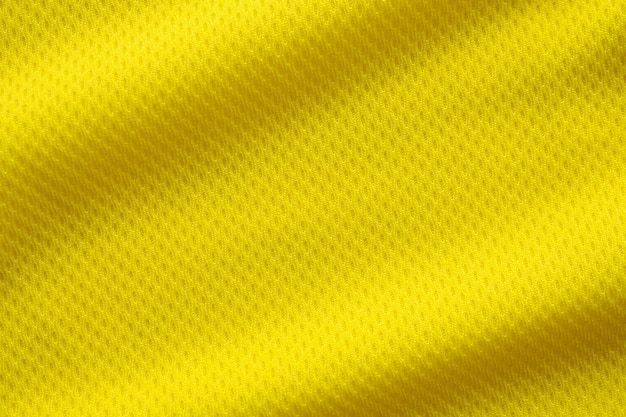 Jersey de fútbol de color amarillo ropa textura de la tela ropa deportiva de fondo, de cerca