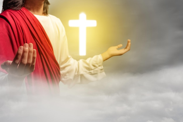 Jesus Christus zeigt das christliche Kreuz