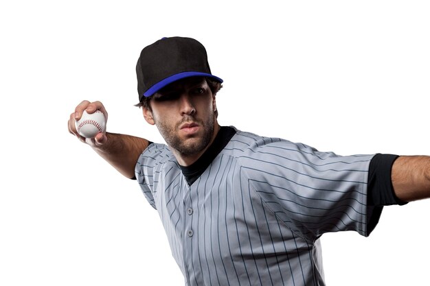 Foto jogador de beisebol com uniforme azul