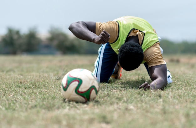 Jogador de futebol no intervalo