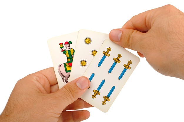 Foto jogo de cartas com cartas napolitanas.