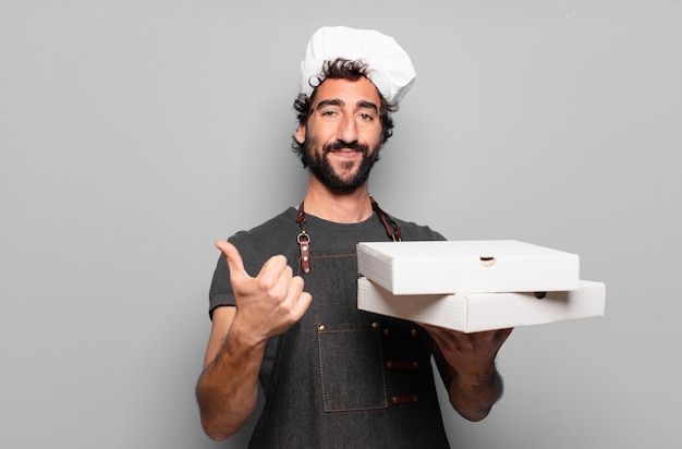 Jovem barbudo. conceito de pizza chef