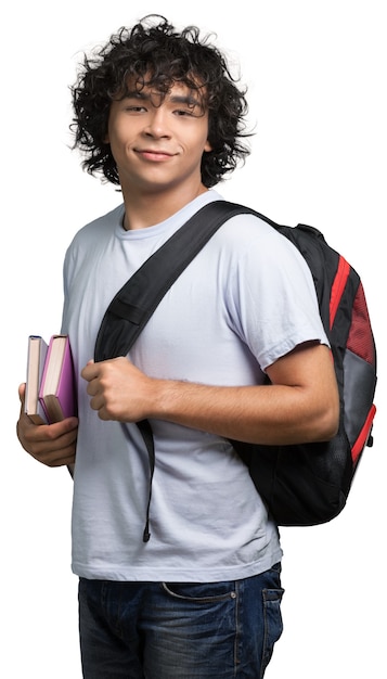 Jovem bonito cacheado com livros isolados no fundo branco