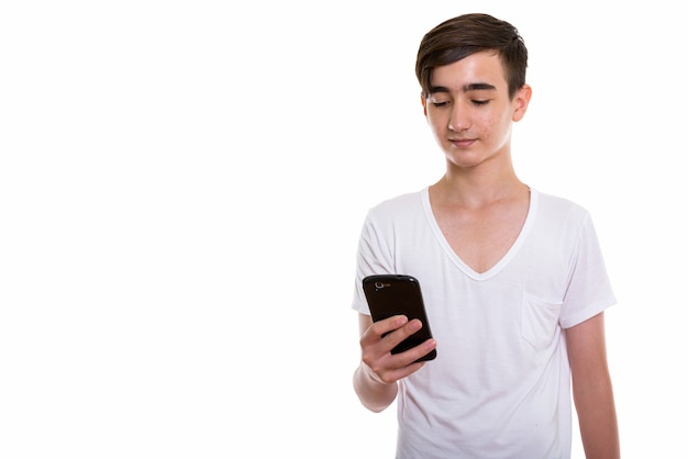 jovem bonito persa adolescente usando telefone celular