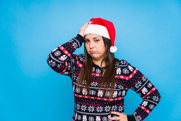 Jovem comemorando o dia de Natal