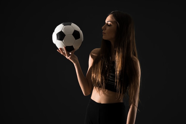 Jovem, desporto, mulher segura, um, bola futebol