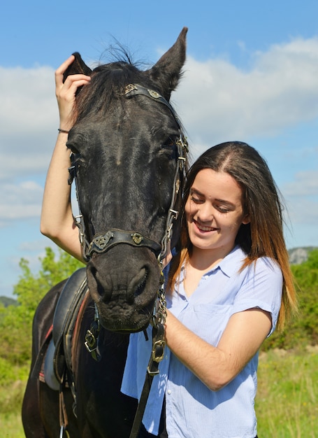 jovem equitação menina