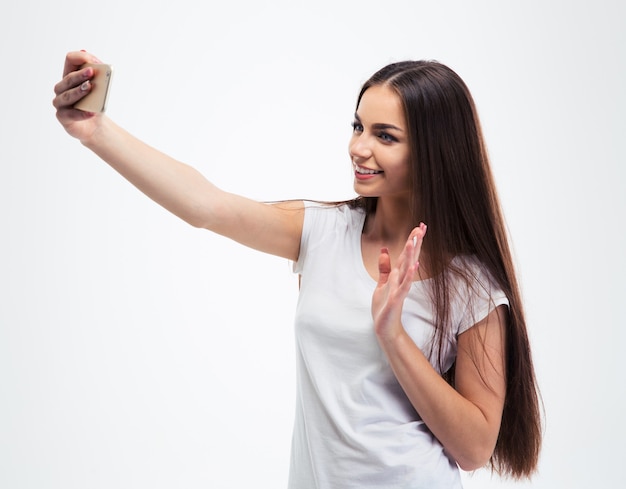 Foto jovem feliz fazendo foto de selfie