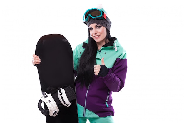 Jovem, mulher bonita, em, roxo, terno esqui, segure snowboard