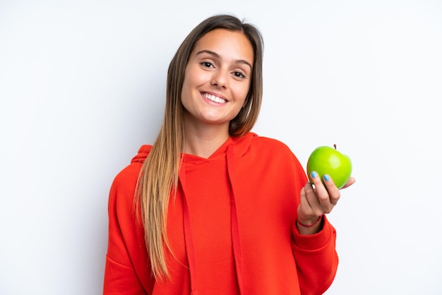 Jovem mulher caucasiana isolada no fundo branco com uma maçã