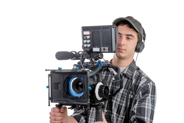 Joven camarógrafo con cámara de cine