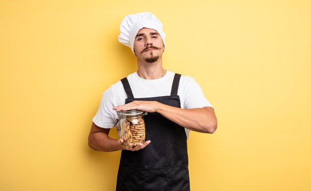 Joven chef con bigote