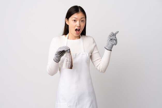 Joven chef sobre fondo aislado