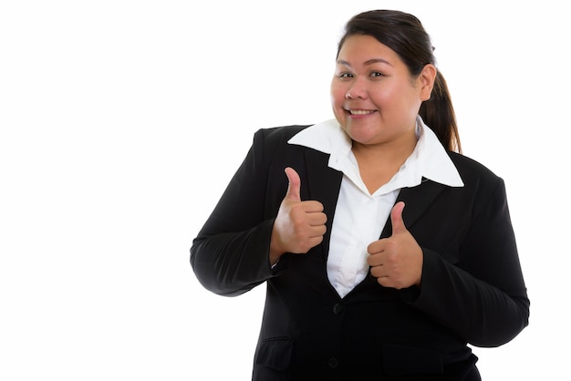 Joven empresaria asiática gorda feliz con traje elegante