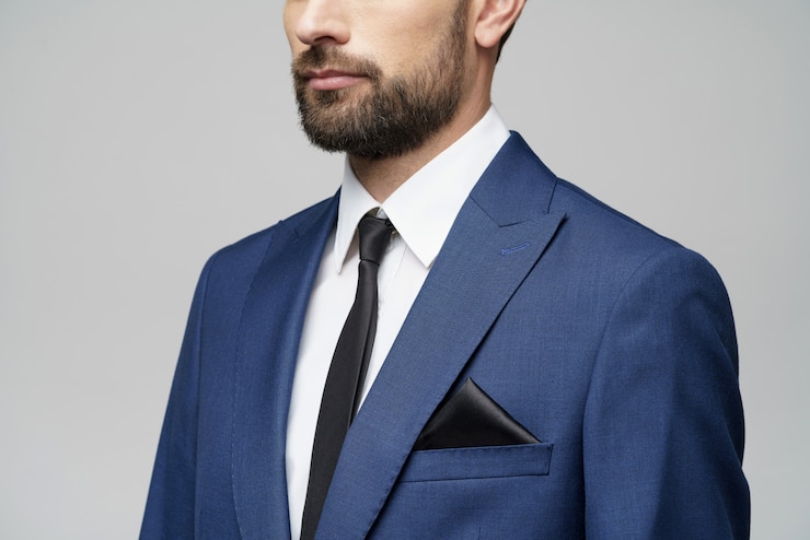 Foto joven empresario elegante guapo vistiendo traje