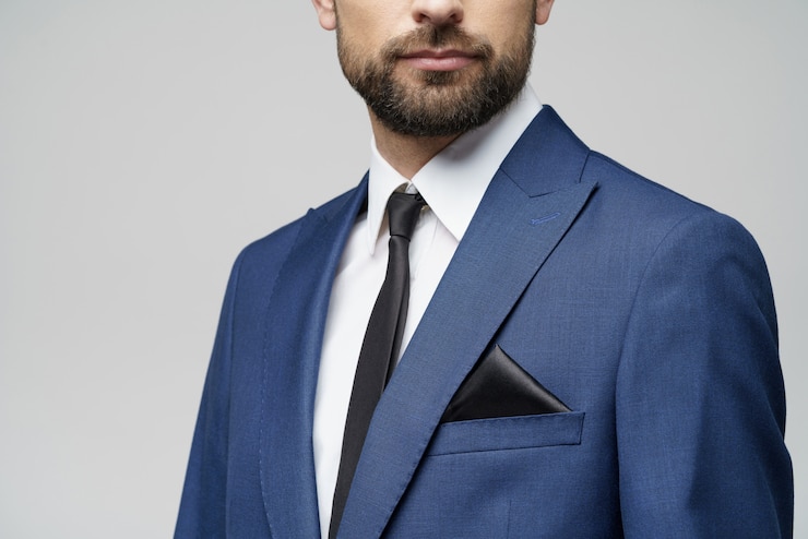 Foto joven empresario elegante guapo vistiendo traje