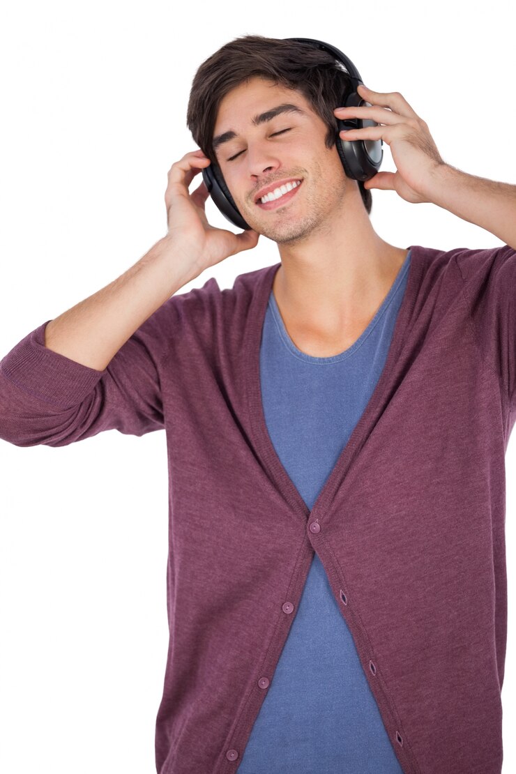 Foto joven escuchando música