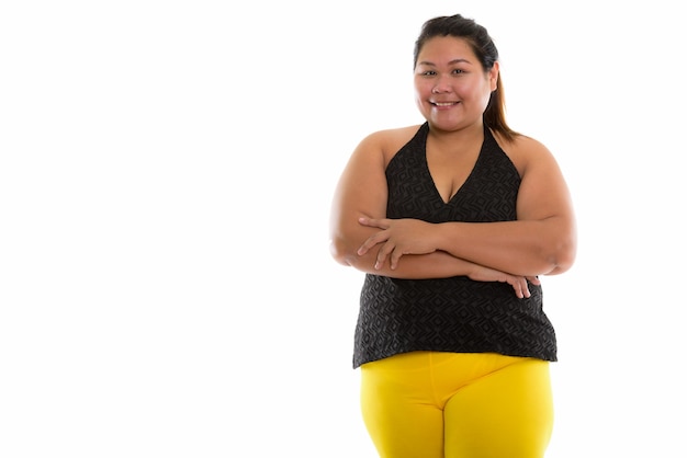 joven, feliz, gorda, mujer asiática, sonriente, con, brazos, cro